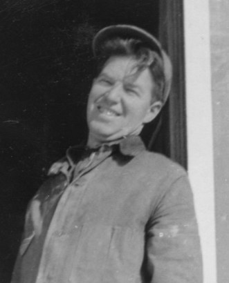 emerson leaning in doorway of grain room, egg baskets cut off (boohoo) 01a